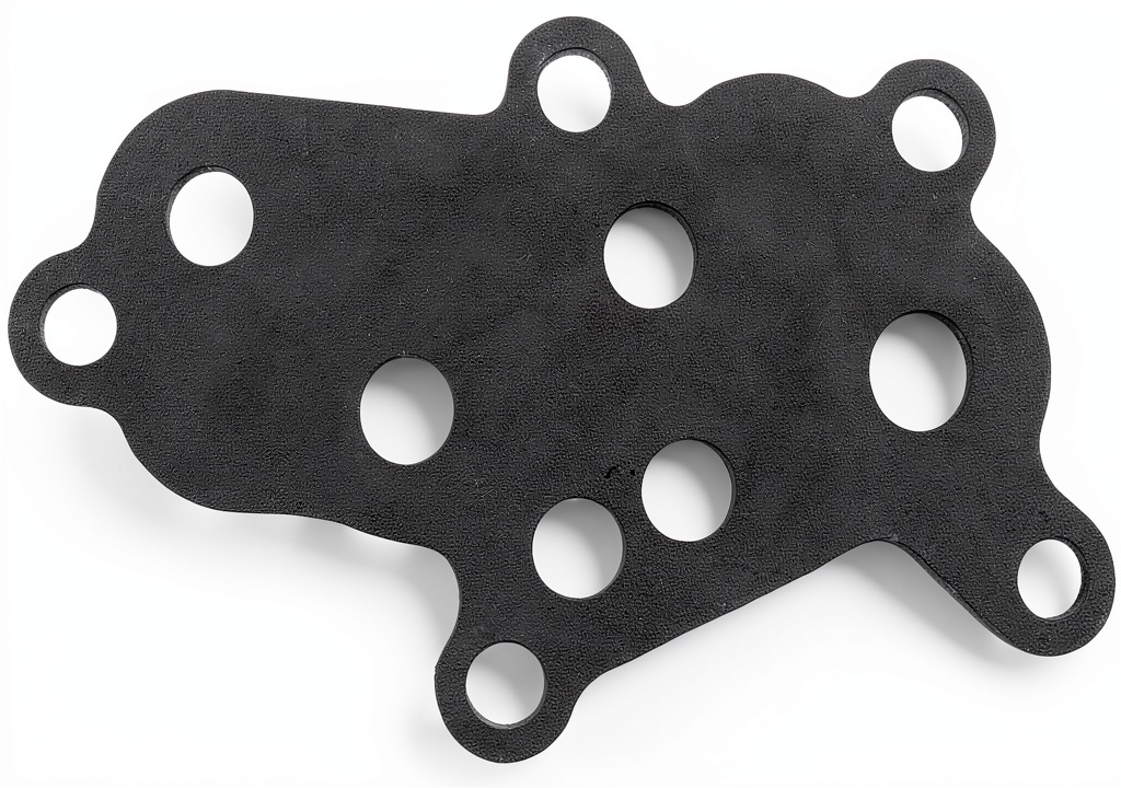 Installing Fel-Pro Oil Pressure Relief Valve Gasket 71405 Round Machined on a wooden workbench